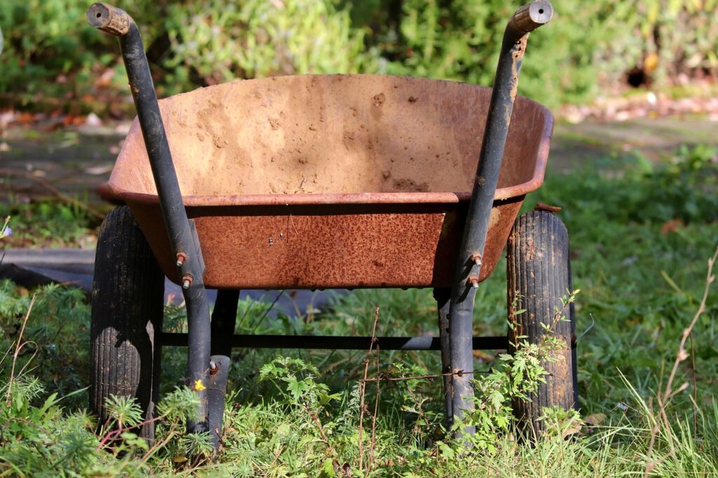 wheelbarrows, gardening, rusty, rusted, garden, tool, working device, garden tools, equipment, fall, clean, clean up, landscaping, tools, work, maintenance, nature, court-4566619.jpg